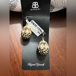 Bansri gold plated drop egg shaped earrings with citrine and black rhinestones.